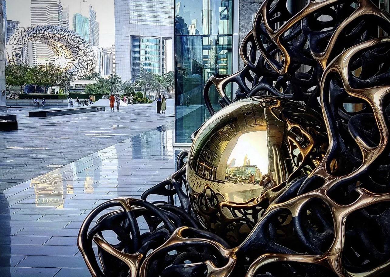 Side view of ‘Sfera Vega,’ showcasing the dynamic interplay of fluid and angular elements at the Dubai International Finance Centre (DIFC)